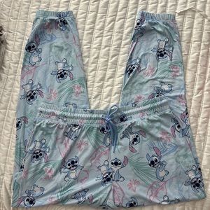 Disney Stitch pajama joggers with elastic tie waist. Size L